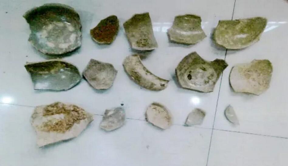 经慈溪市文物保护中心认定,梁某盗掘地点位于上林湖越窑遗址保护